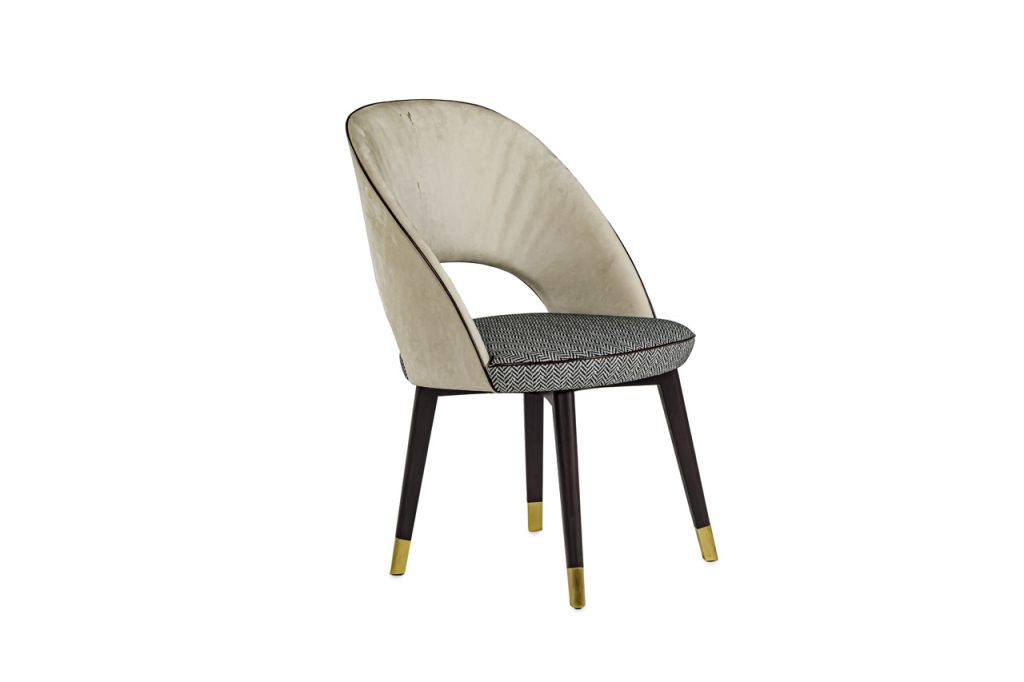 chair made of beige and gray leather on wooden and brass legs