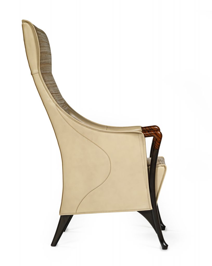 Exterior seat backrest and armrests upholstered in beige saddle leather.