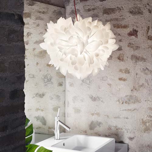 hanging lamp made in the shape of a large flower based on natural pieces in a matte white tone