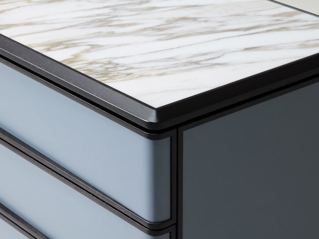 sideboard with front drawers made of wood top in white marble in a sky blue tone