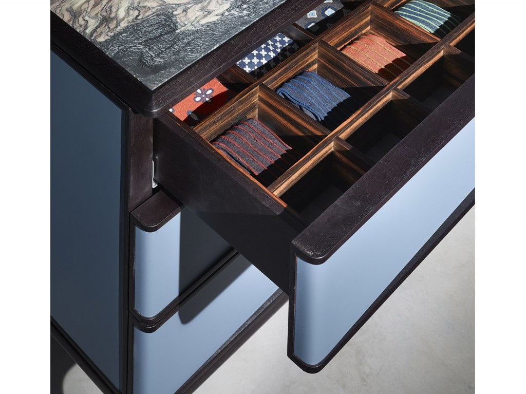 sideboard with front drawers made of wood top in white marble in a sky blue tone