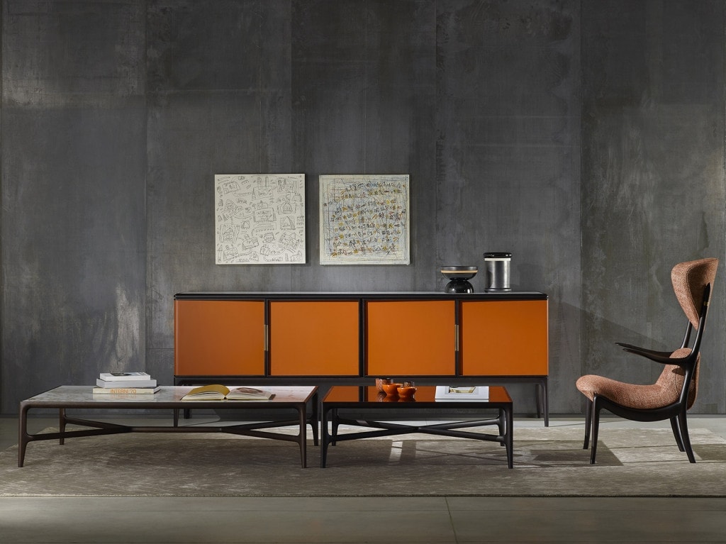 sideboard made of walnut wood base finished in marble leather in a tone of orange, coffee and white on a room