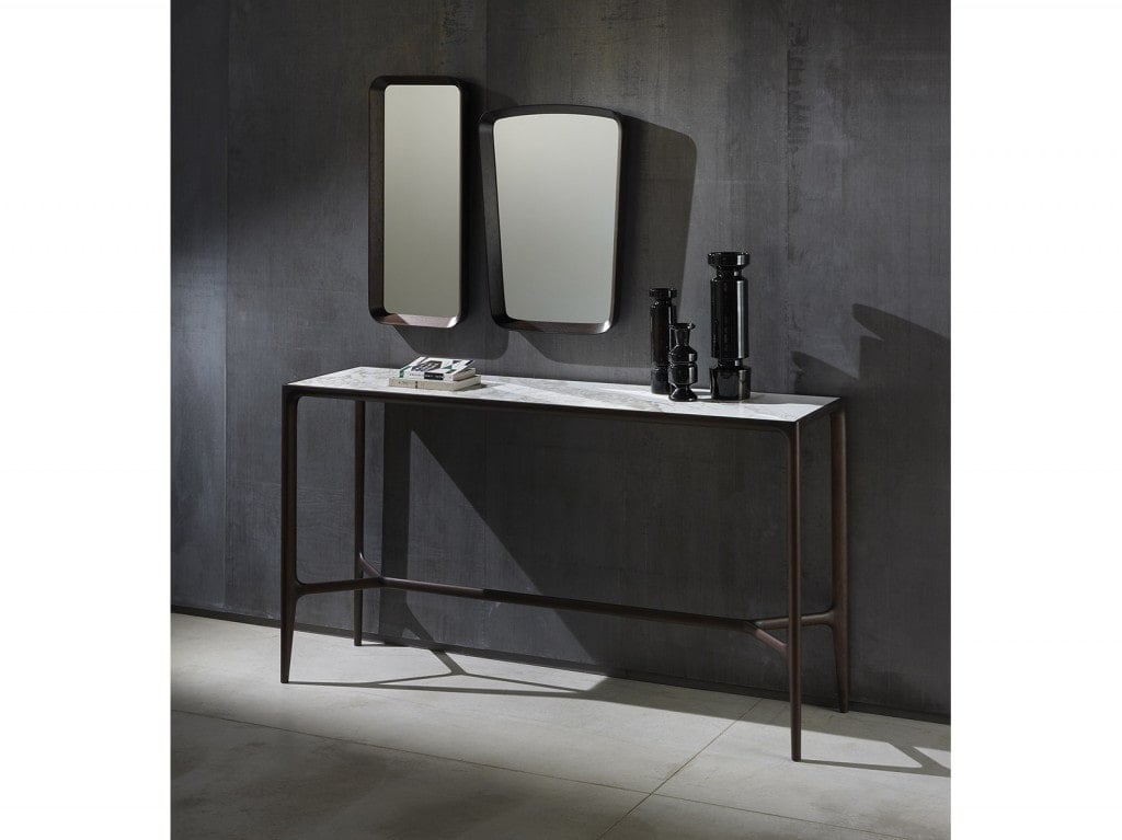 table made of steel base with marble top in a white tone in a room