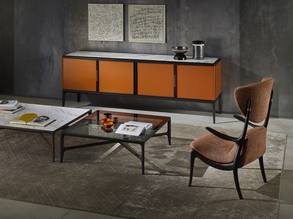 small table made of wood with glass top in a black tone on a living room