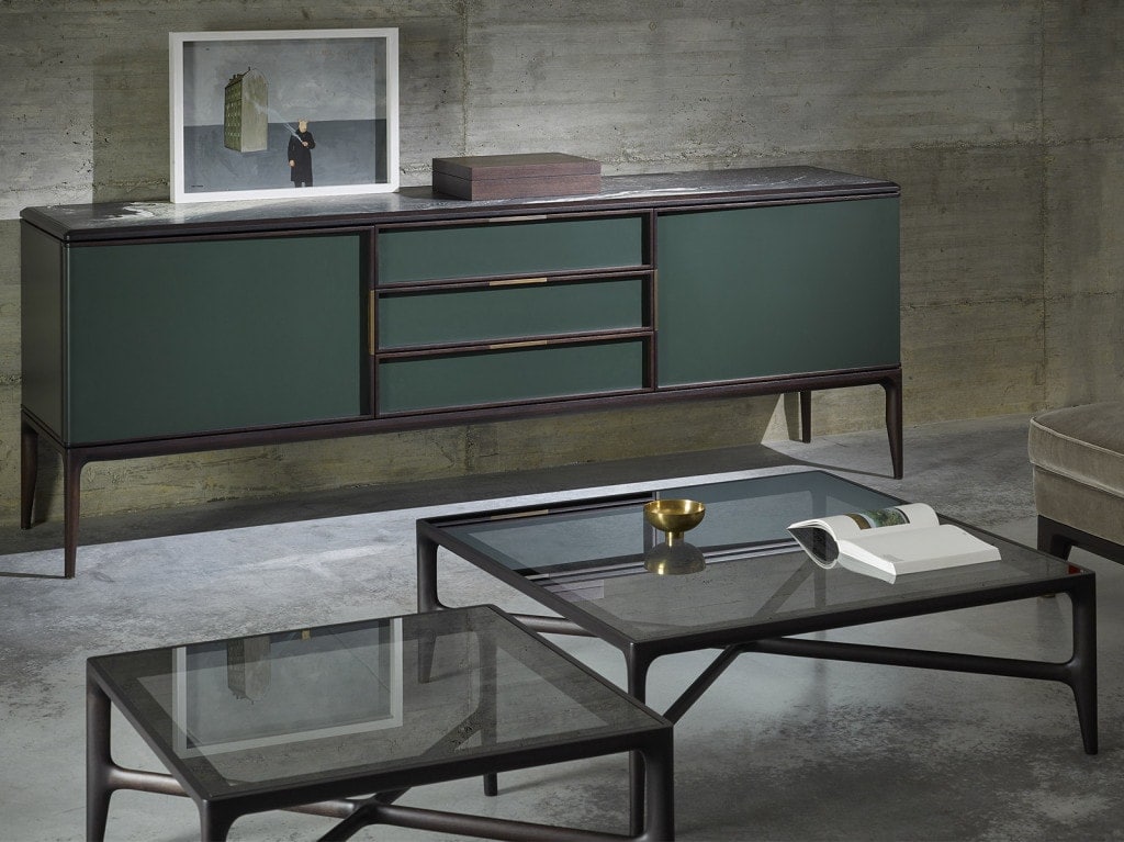 two coffee tables made of black walnut wood and crystal tops in a transparent black tone on a living room