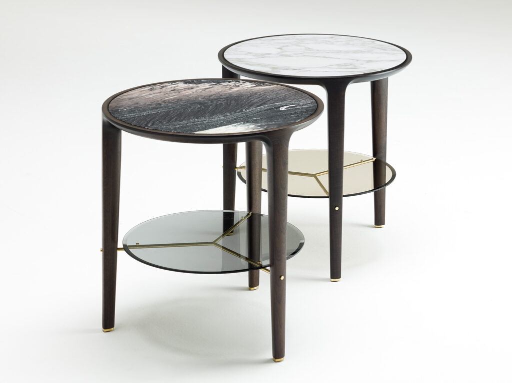 two small tables made of wood with marble top on a glass in brown, white and beige tones