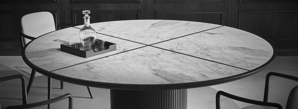 table made of brass and marble wood in a circular shape