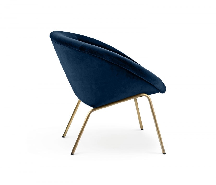 armchair made of velvet in a light blue tone with brass legs on a white background