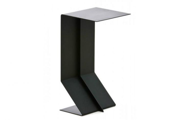Sculptured side table in a unique design made from a metal base in a black tone on a white background