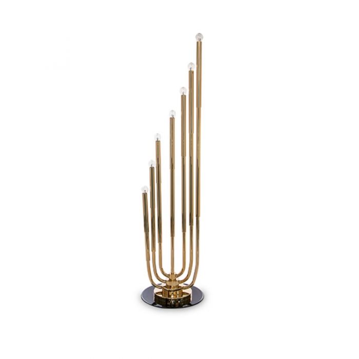 lamp made of gold-colored metal and silver finishes and rotating black base