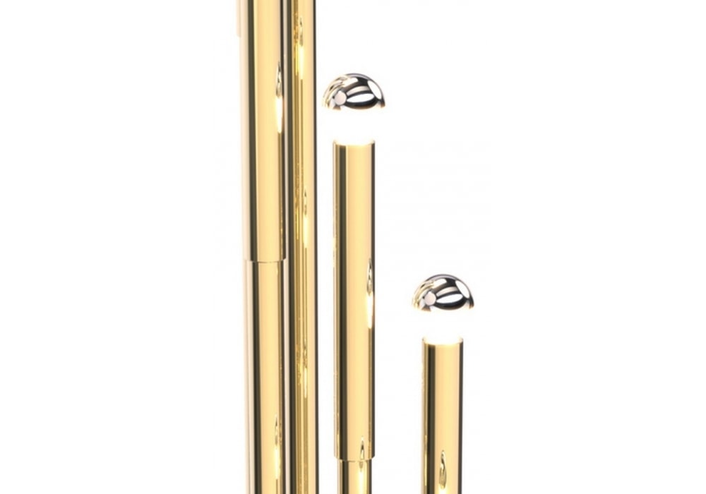 lamp made of brass metal base in a gold and silver tone on a white background