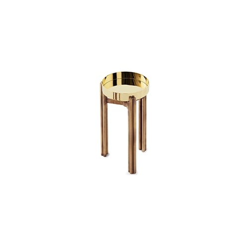 table made of burnished brass base and marble top in a golden tone on a white background