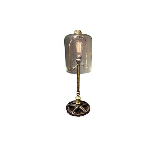 table lamp made of metal pieces and transparent glass in a golden tone