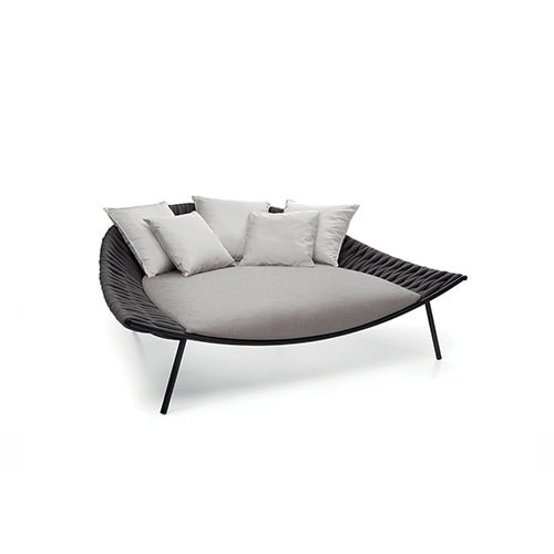 Rod Arena Chair blends comfort and contemporary design with its spacious form and plush cushions, perfect for relaxing in open air settings.