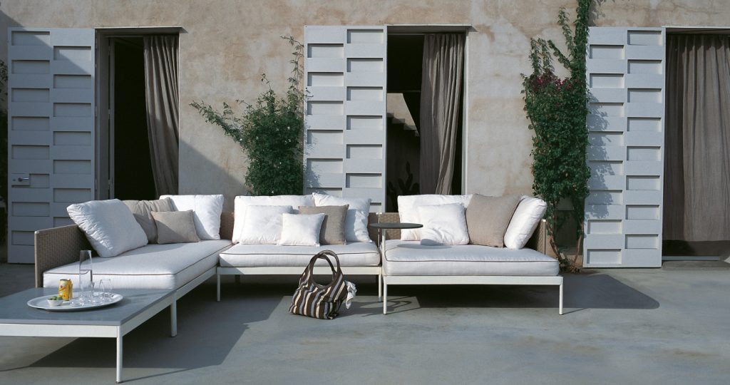 sofa made of steel base and cushions upholstered in a white tone