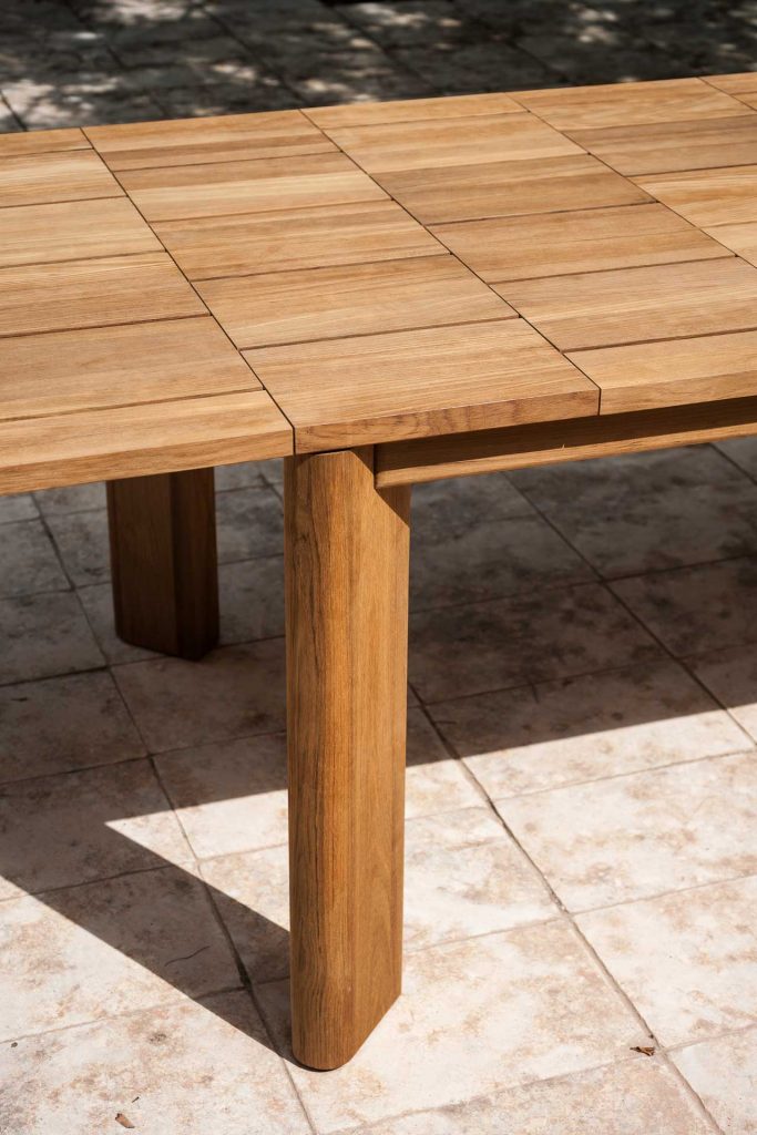 dining table made of wood base in a light brown tone with a checkered finish