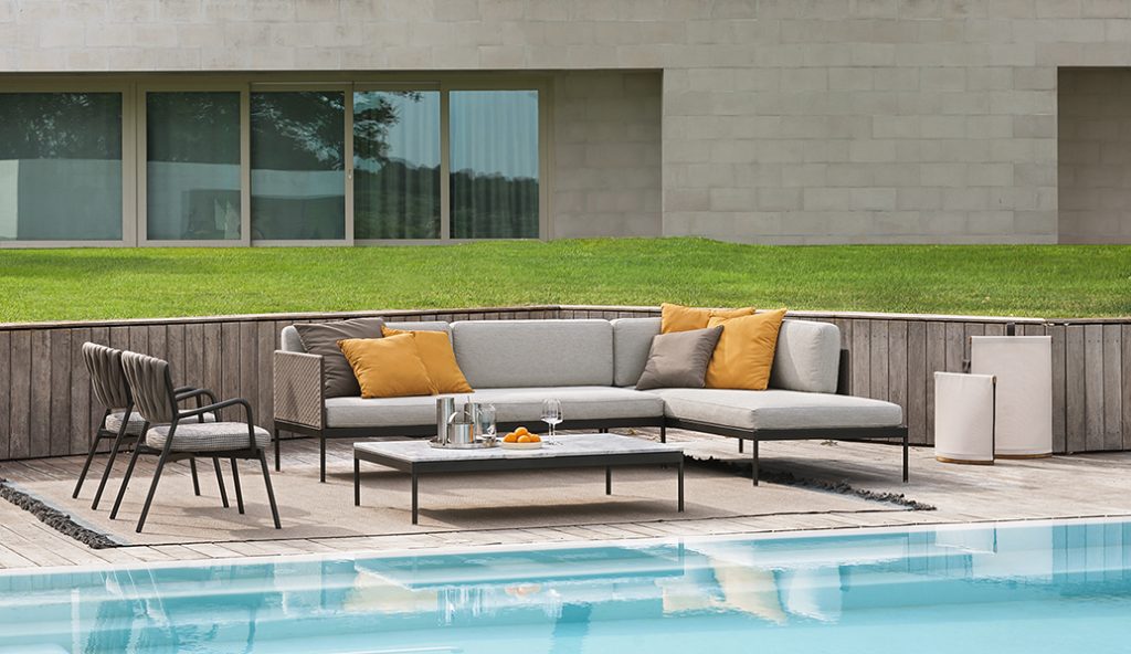 sofa made in the shape of an L in a gray color tone on the outside