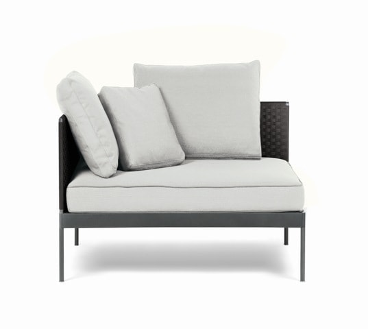 armchair made of black stainless steel structure with cushions made of fabric in a white tone