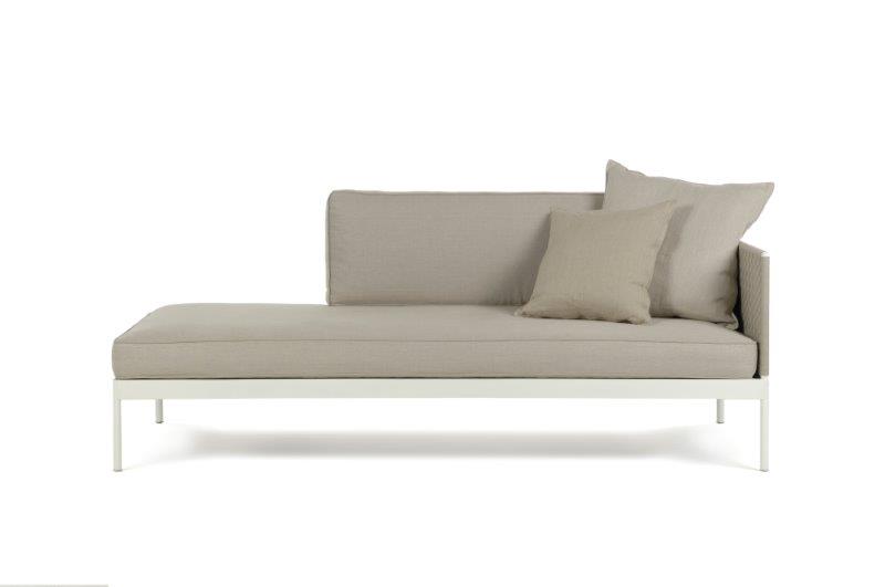 Modular sofas made from stainless steel with cushions upholstered in fabric in a beige tone