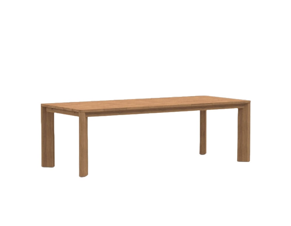 A rectangular outdoor dining table in natural teak, shown at an angle to highlight its clean proportions, sturdy square legs, and refined simplicity.