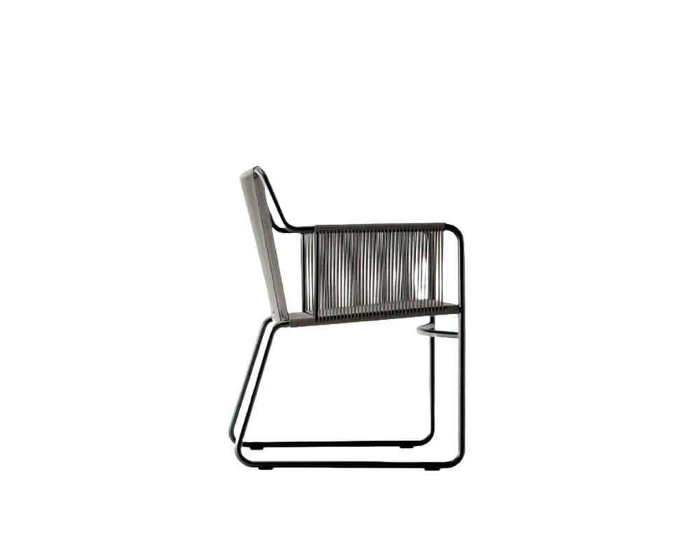 A side profile of the outdoor armchair showcasing its black metal frame, taupe rope weave, and minimalist silhouette.