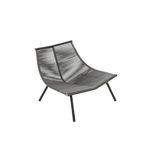 Rod Laze Chair has a low, sculptural profile with woven cord seating over a slim metal frame, designed for relaxed outdoor lounging.