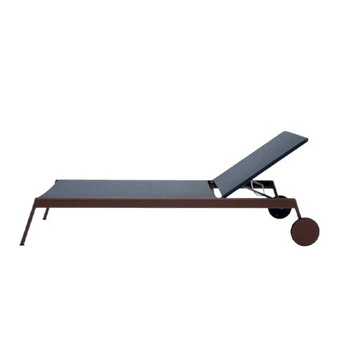 Rod Piper Lounge Chair combines a modern profile with a comfortable reclining surface, making it an elegant choice for outdoor lounging.