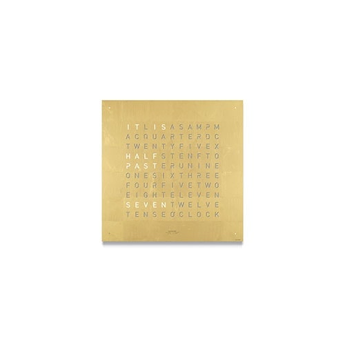 QLOCKTWO Classic in gold in front of a white background