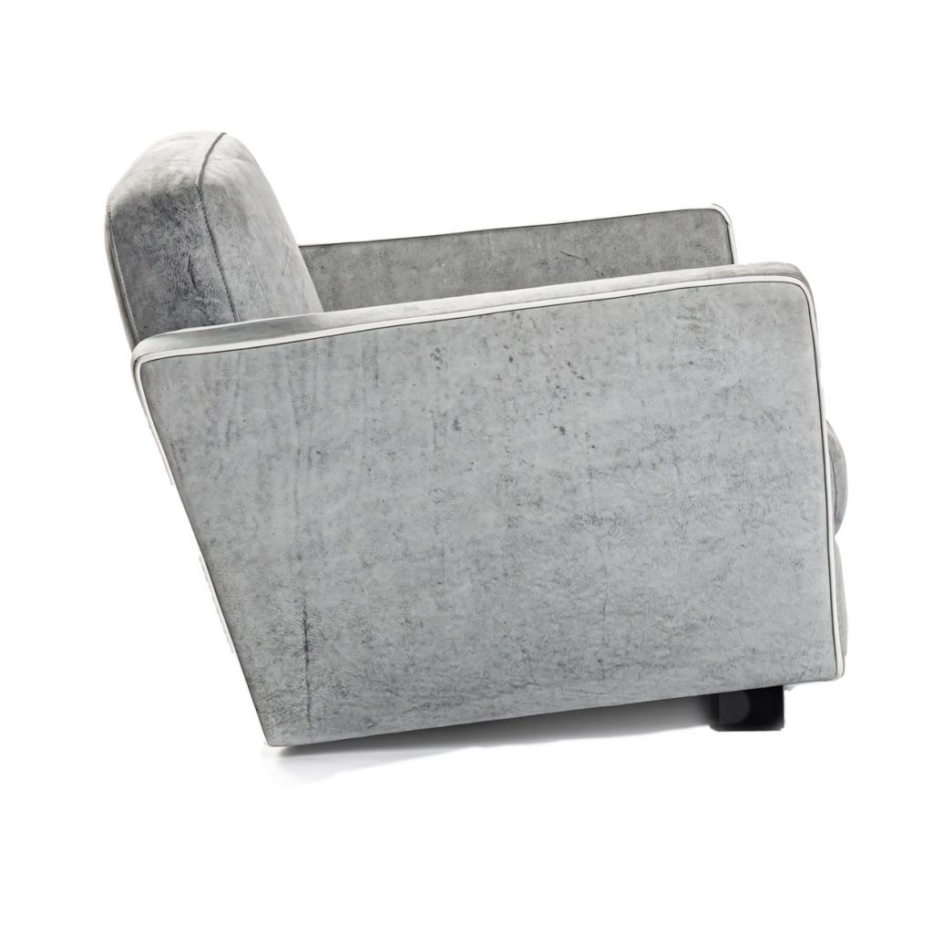 Side view of Capri Armchair in front of a white background