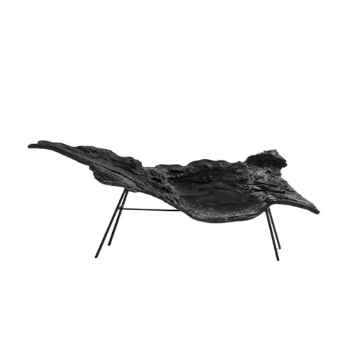 ImpLab Bioma captures the raw essence of nature with its rugged surface and organic shape. Elevated by sleek metal legs, it balances natural irregularity with modern structure for a bold artistic presence.