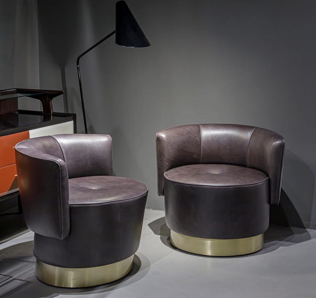 two armchair made of swivel satin metal base upholstered in dark brown leather