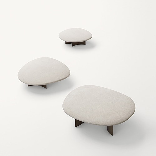 Three Isole tables in different sizes in front of a white background