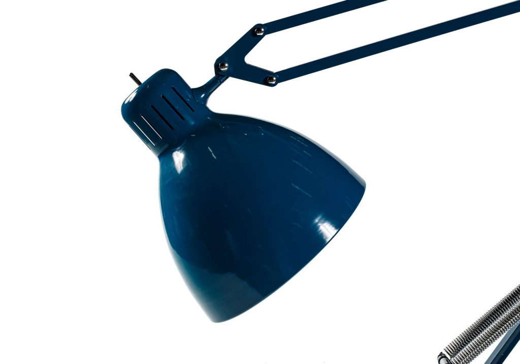 Close up of head of Great JJ lamp in front of a white background