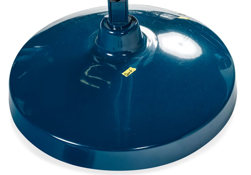 Close up of base of Great JJ lamp in front of a white background