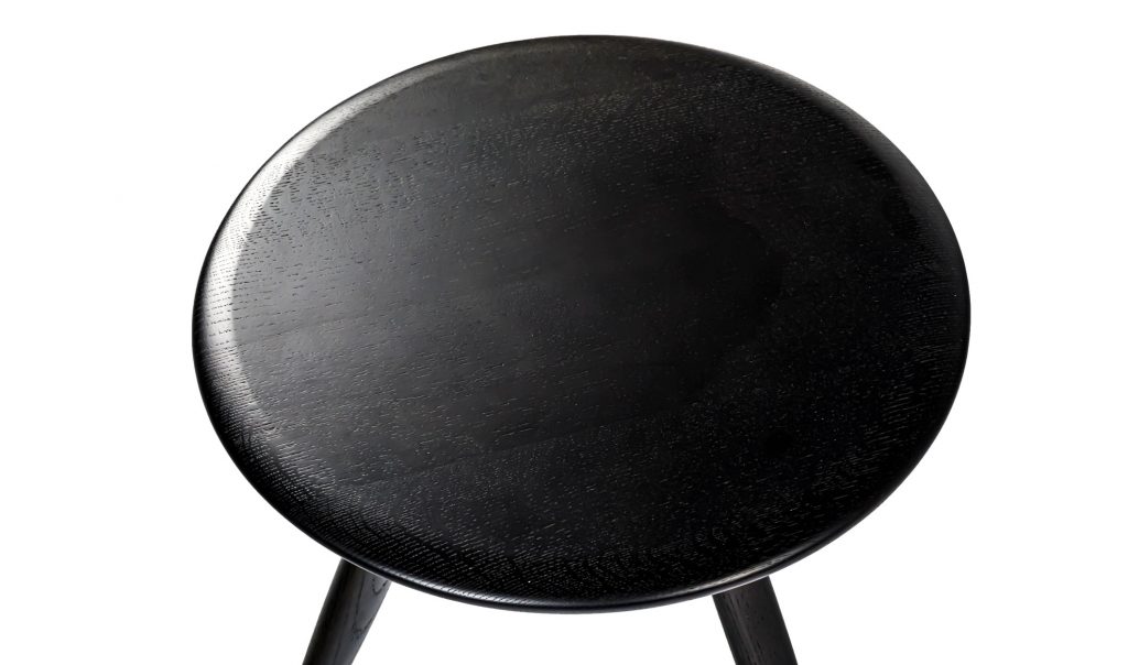 Top close up view of Mo nineteen hundred and one small end table in front of a white background