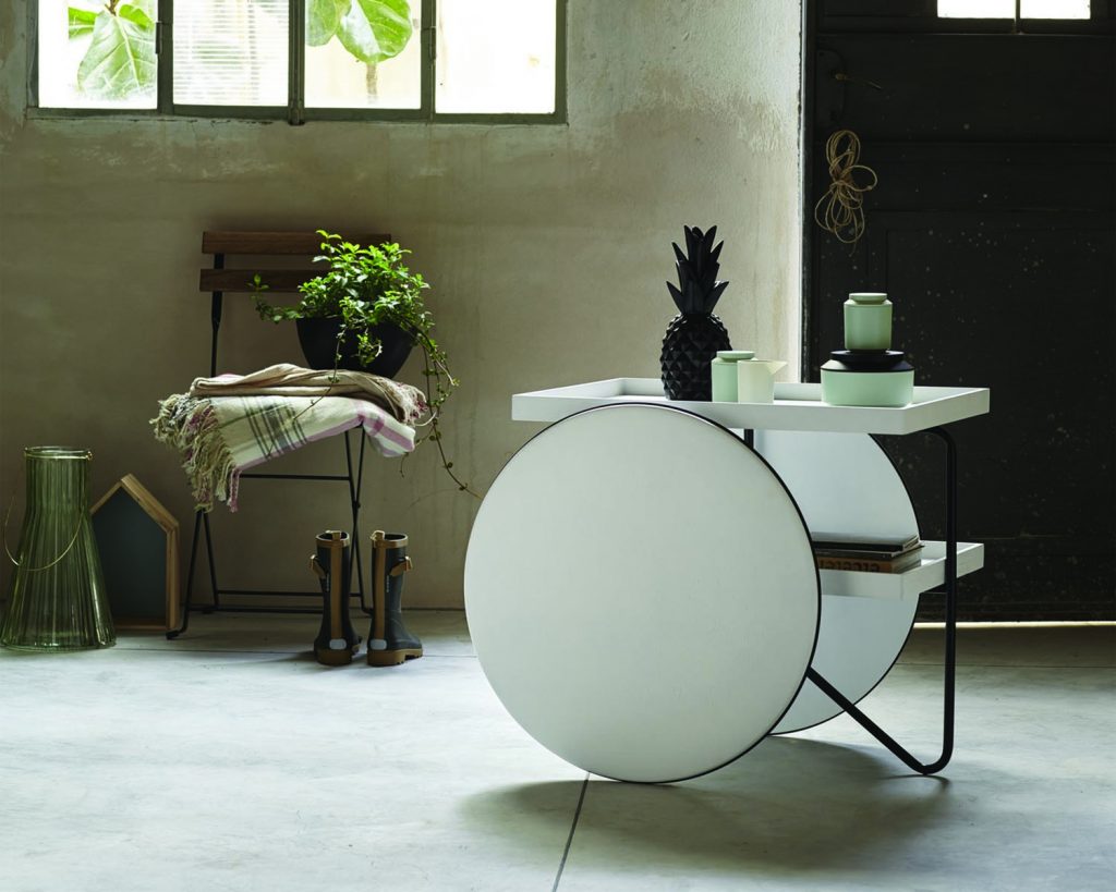 Chariot in white in a room filled with plants
