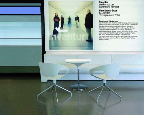 Two Vad in white in a museum setting