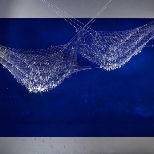 Lacrime Pescatore with a blue background
