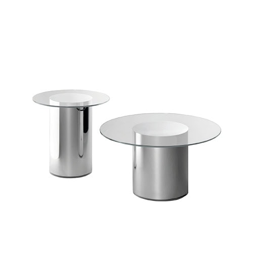 BD 2001 Side Table shown in two sizes. Both feature polished steel cylindrical bases and circular clear glass tops. The taller table has a smaller diameter, while the shorter one is wider. The background is pure white.