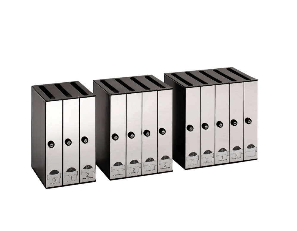 A modular arrangement of vertical stainless steel mailboxes in varying configurations. Each unit features secure locks, top mail slots, and individual label holders for easy organization.