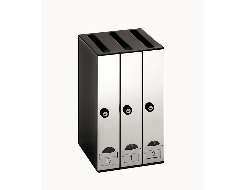 A compact unit of three vertical stainless steel mailboxes with black housing, featuring individual locks, mail slots on top, and customizable label holders for user identification.