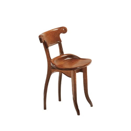 The BD Batllo Chair displays sculptural, organic curves with a compact, low-profile backrest. Crafted in warm brown wood, its smooth finish highlights the natural grain and artisanal construction.