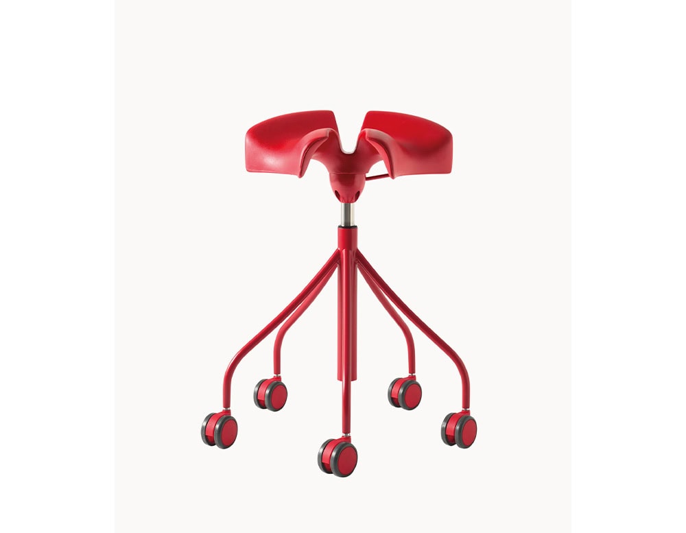 The BD Binaria Stool features a dynamic red finish with a split saddle seat and five caster wheels, emphasizing ergonomic support and smooth mobility in a bold, contemporary design.