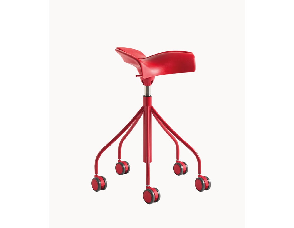 The BD Binaria Stool stands out with its vivid red finish, saddle-shaped seat, and five-wheel base. Its bold color and fluid lines highlight both mobility and ergonomic comfort.