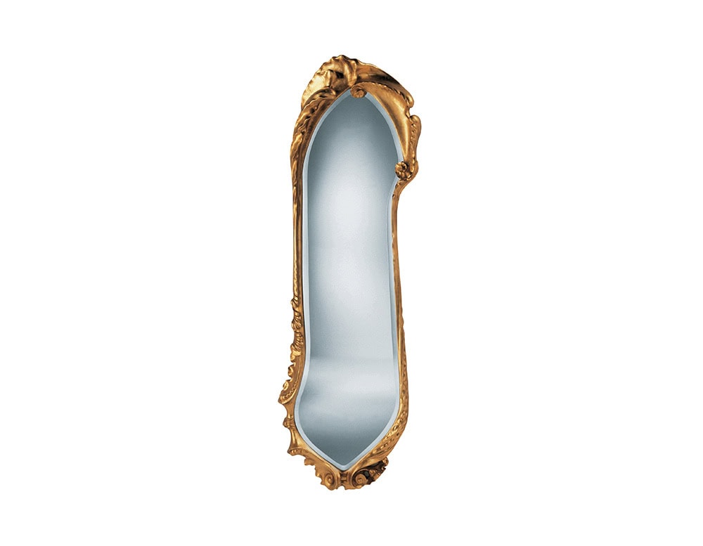 The BD Calvet Mirror features an elongated oval shape with an ornate golden frame. Its flowing contours and vegetal motifs create a sculptural piece that blends functionality with decorative art.