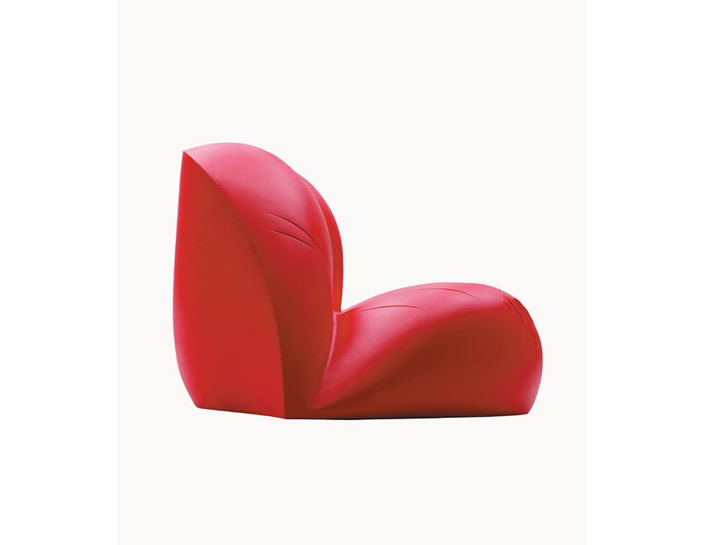 A side view of the Dalilips Sofa reveals its sculptural curves, capturing the bold, surrealist gesture in a striking three-dimensional form.