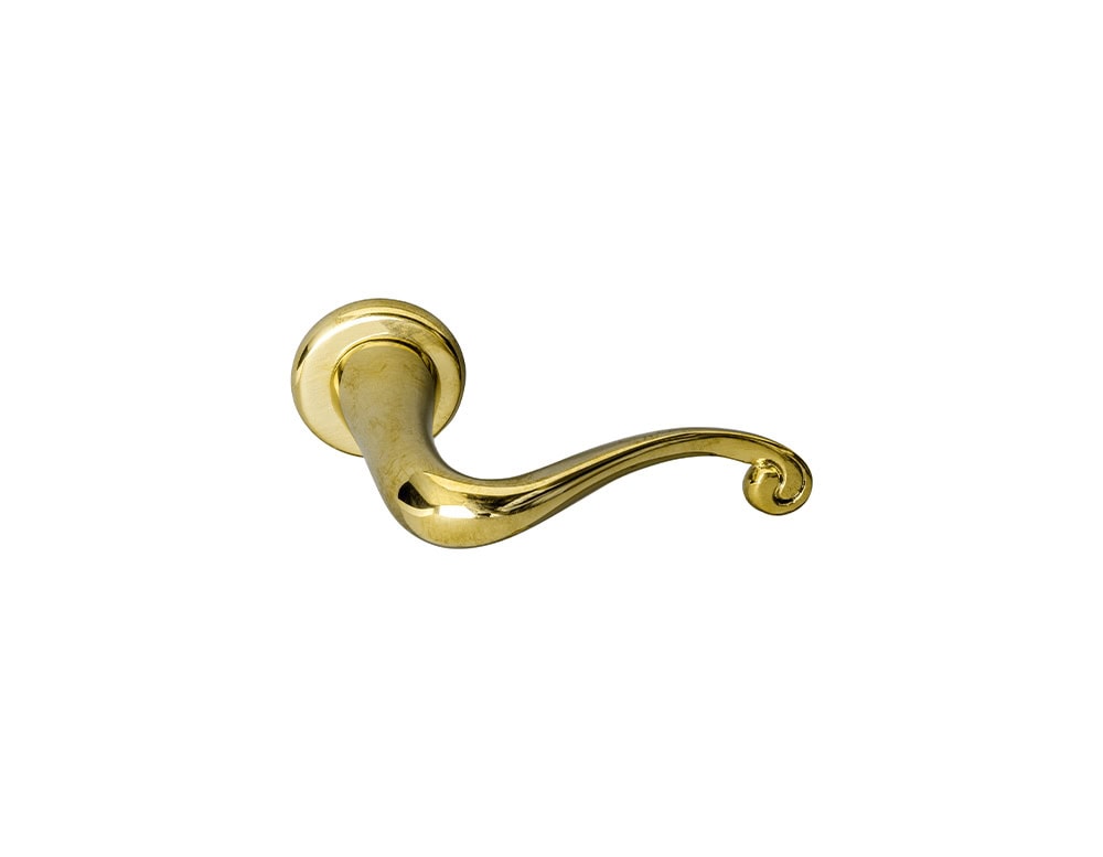 A brass door handle with a flowing, organic silhouette. Its smooth, polished surface and elegant curve end in a small spiral detail, giving the piece both function and a refined decorative quality.