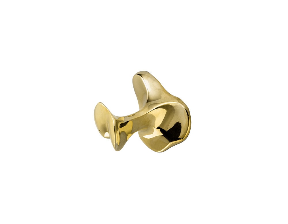 The Gaudí Door Knob in brass, with soft curves and a polished finish that reflects Antoni Gaudí’s organic design language.