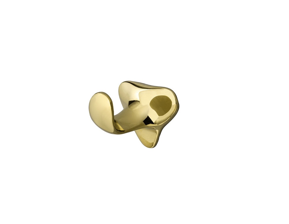 A close-up of the Gaudí Door Knob in polished brass, showcasing its fluid, nature-inspired silhouette.