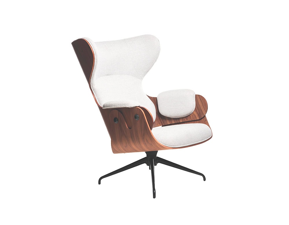 Lounger Armchair in off-white upholstery with rich walnut veneer shell. Elegant and ergonomic, it rests on a black swivel base, blending contemporary comfort with iconic design.
